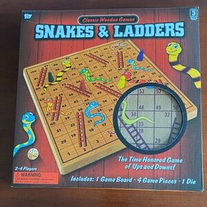 Snakes and Ladders game. Just like Chutes and Ladders. NWT